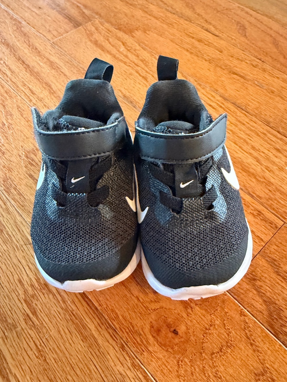 Nike Toddler Black and White Slip-On Sneakers